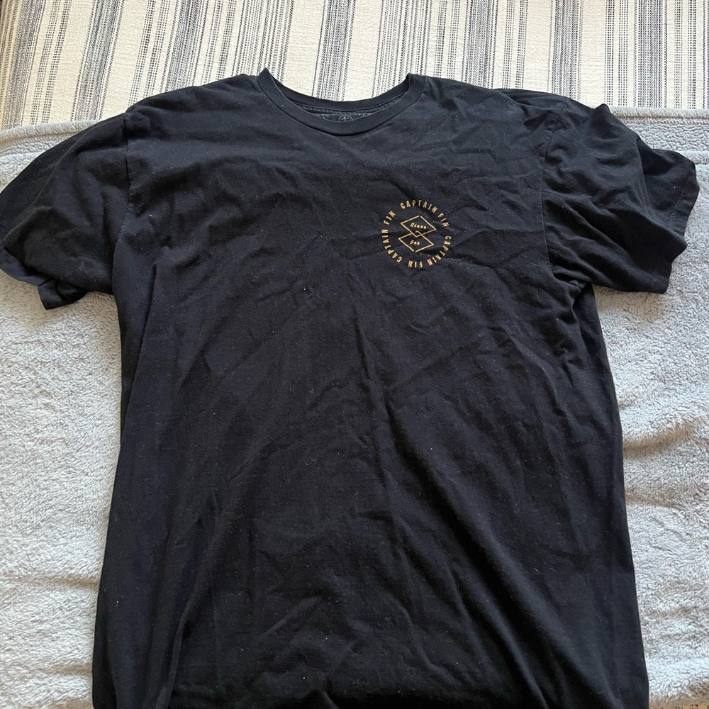 Black Short Sleeve Crewneck T-Shirt with Small Gold Chest Graphic